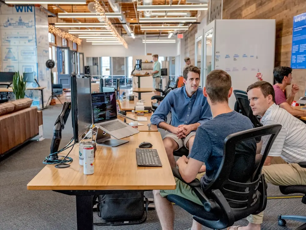 Marketing team reviewing campaign plans together